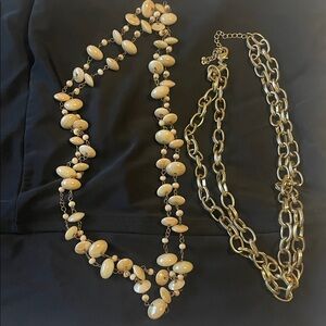 Two double chained necklaces.